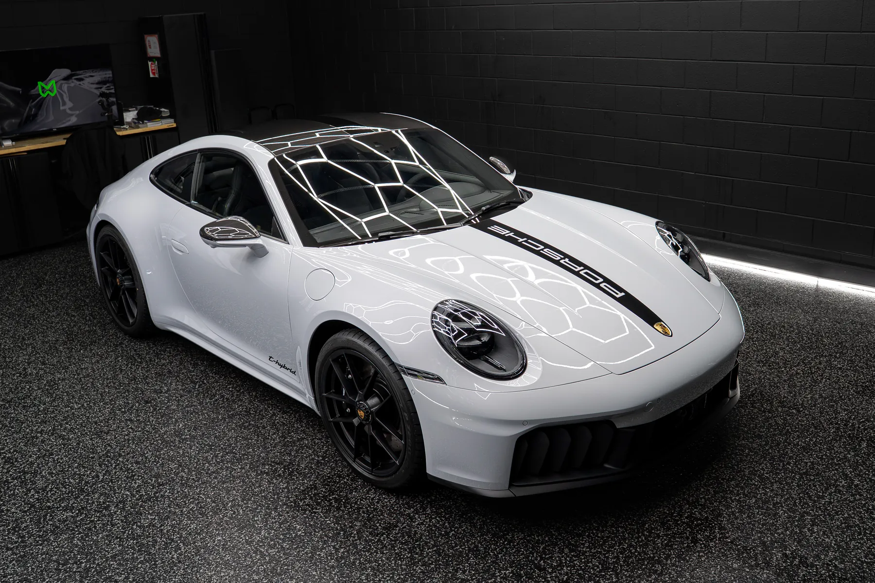 White Porsche 911 Carrera GTS in the Motorsport Wraps studio